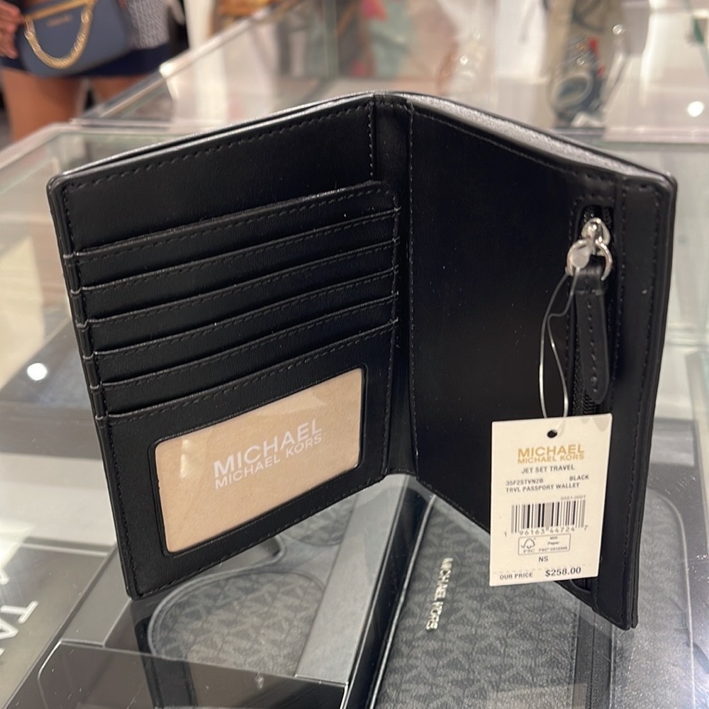 Michael Kors Jet Set Travel Passport Wallet
Black Signature/Silver-Tone Hardware - Picture 9 of 16